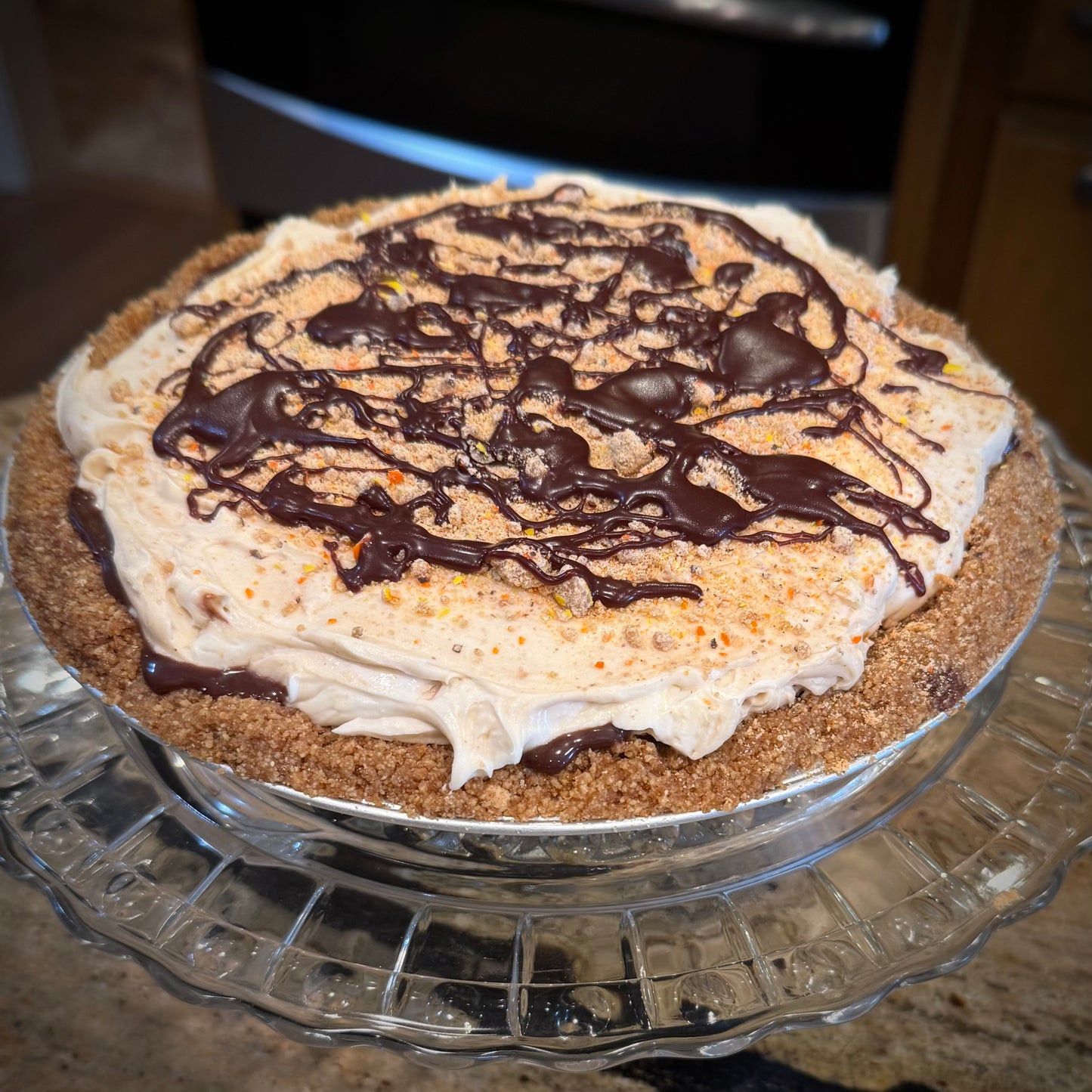 Peanut Butter Fudge Swirl Cheesecake Pie (8 inch)